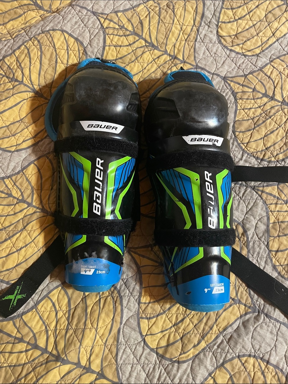 Bauer Black Hockey Shin Guards with Blue & Lime Green Accents